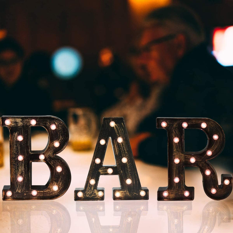 Vintage bar sign with decorative lights