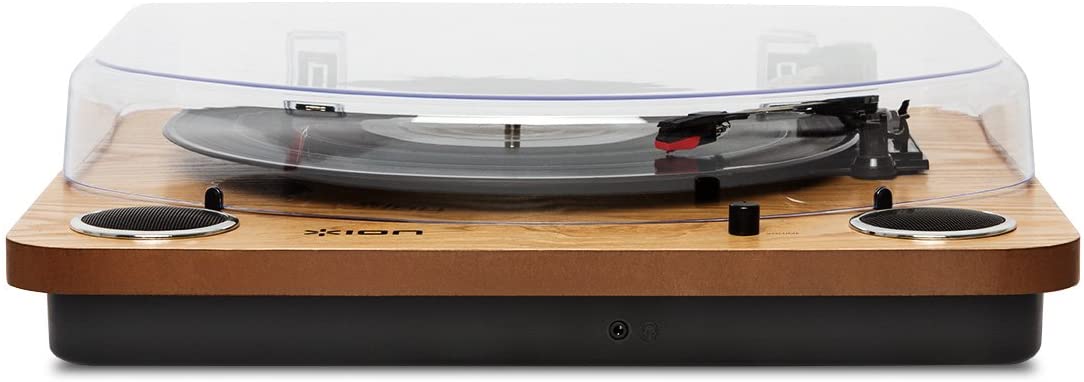 Vinyl turntable with built-in speakers, natural wood finish