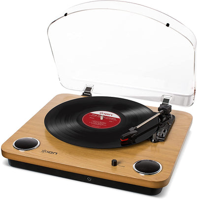 Vinyl turntable with built-in speakers, natural wood finish