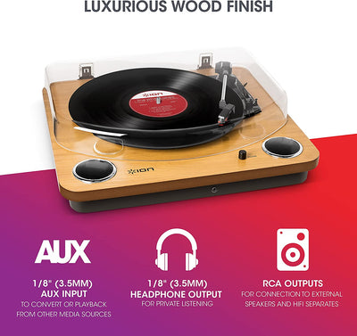 Vinyl turntable with built-in speakers, natural wood finish