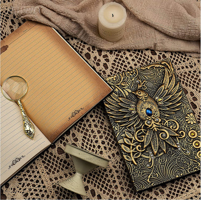 Embossed vintage leather journal notebook with pen set. Phoenix