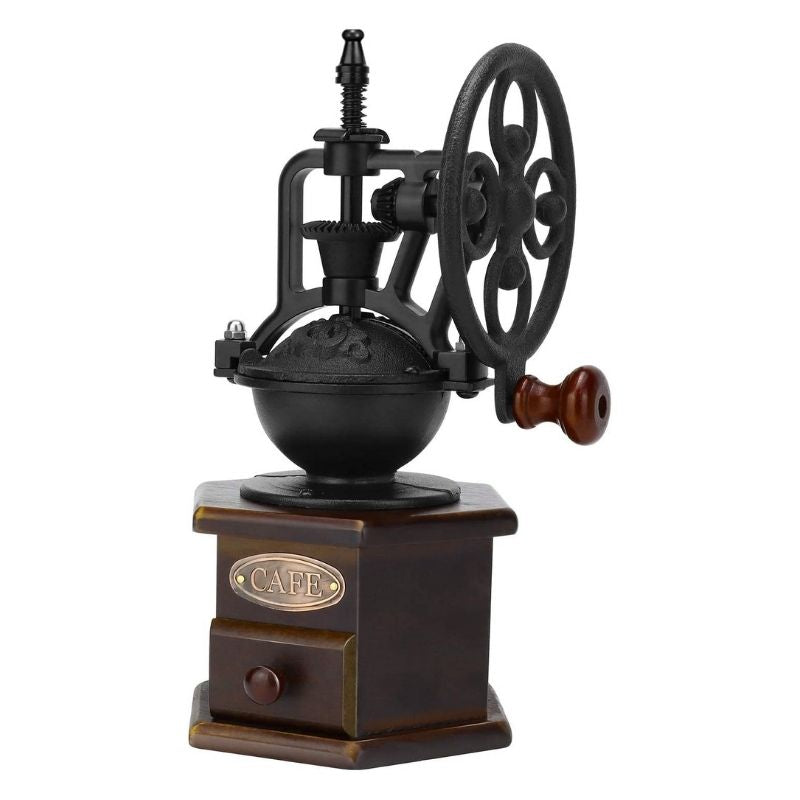 Old manual coffee grinder, with cast iron crank